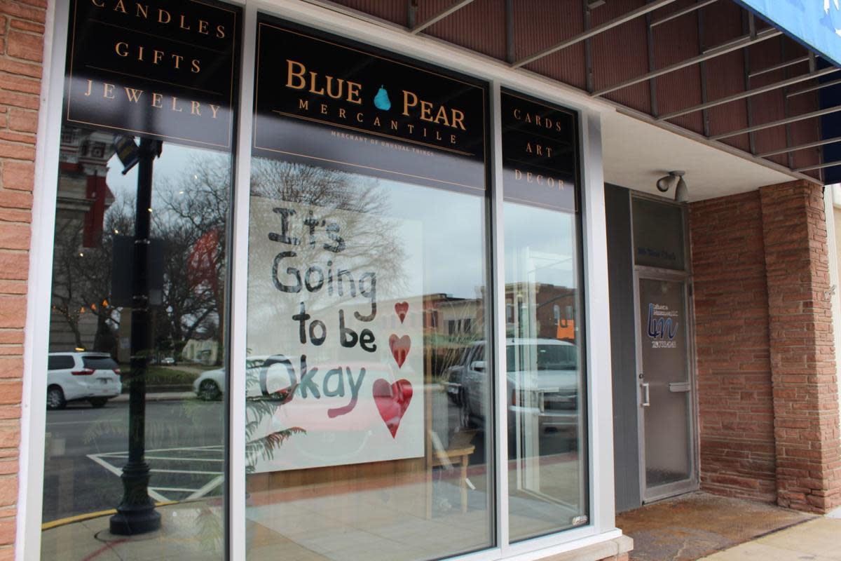 Blue Pear supportive sign