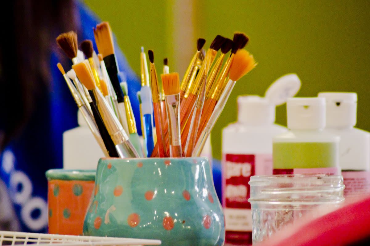 Paintbrush and art supplies