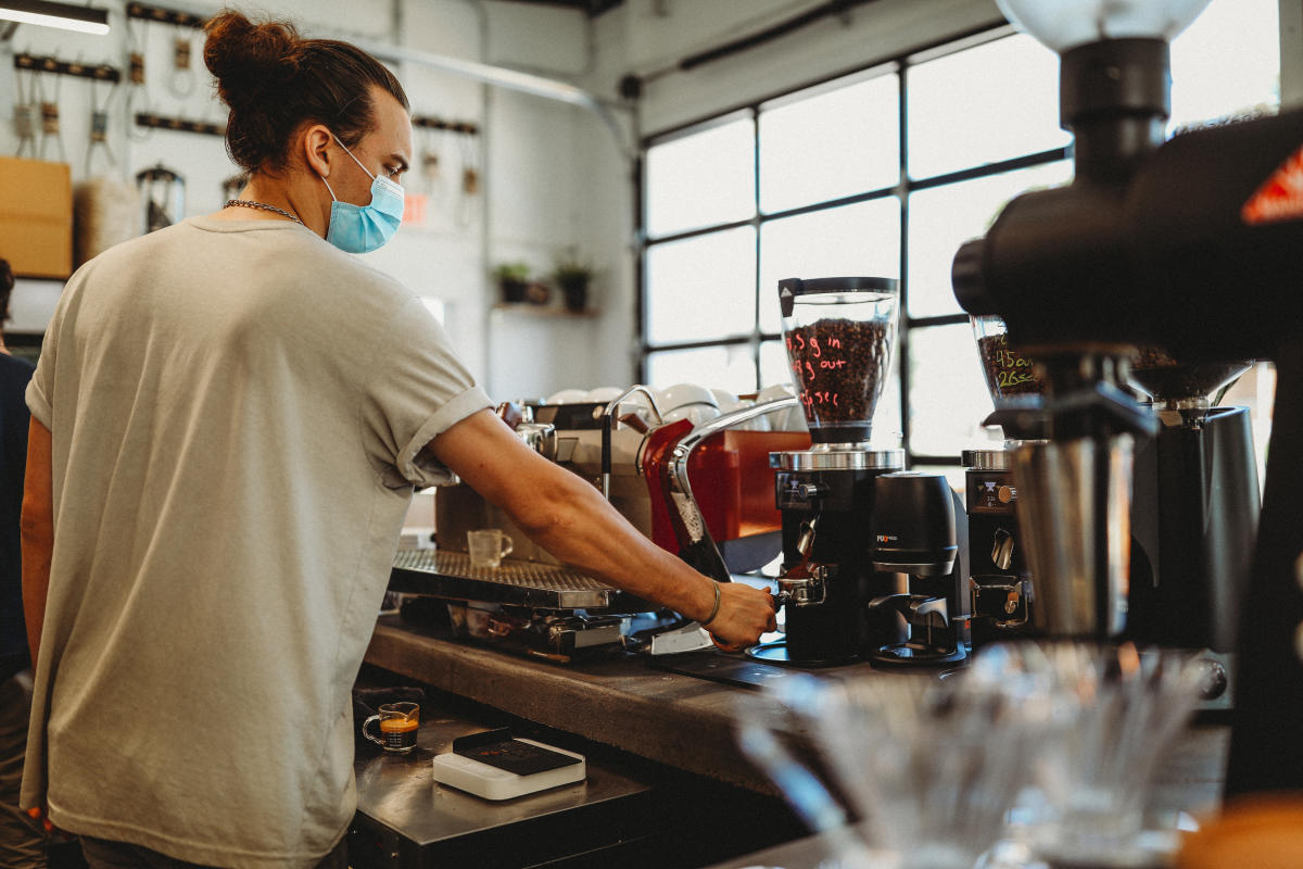 Barista making coffee at Upshot Coffeehouse in St. Charles, MO