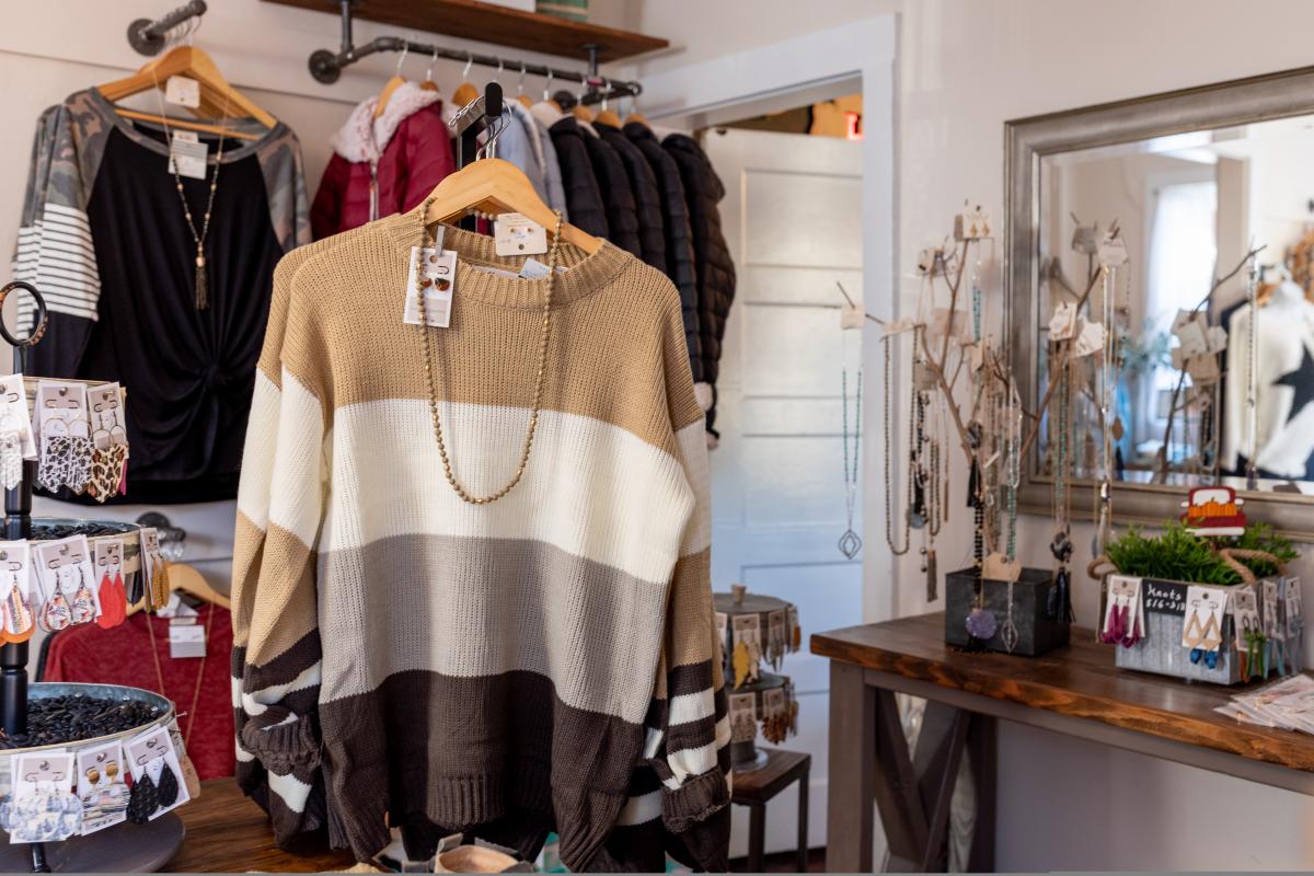 A sweater and other merchandise at U Defined Boutique on Main Street in St. Charles, Missouri.