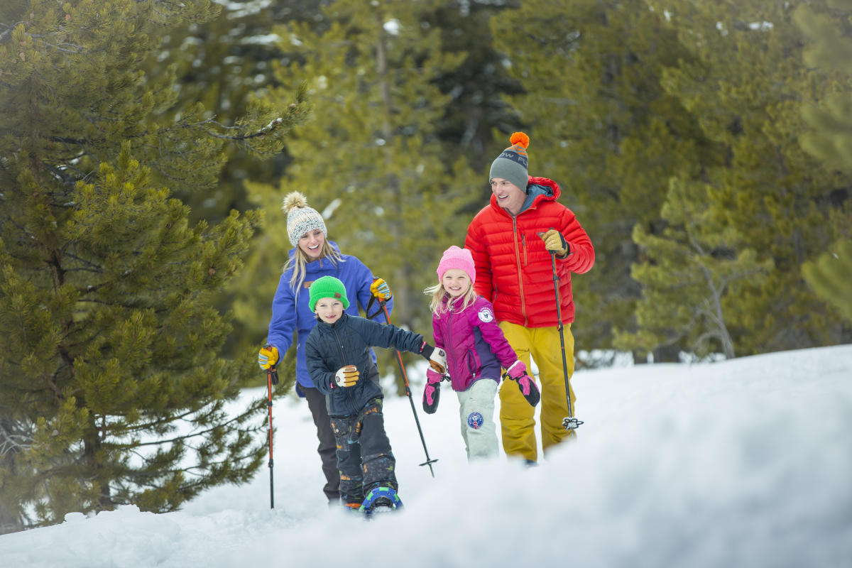 A family enjoys snowshoeing in the winter in Steamboat Springs, Colorado