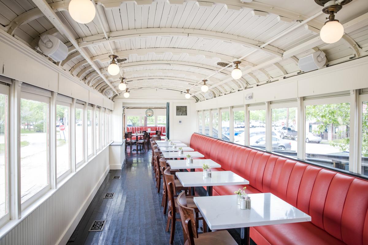 Lola Restaurant in Covington's dining area is a converted train car.
