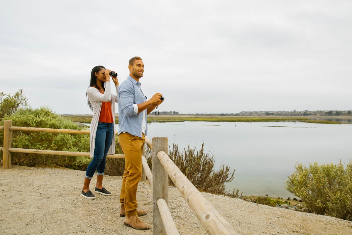 Bolsa Chica Ecological Reserve. Couple looking out.