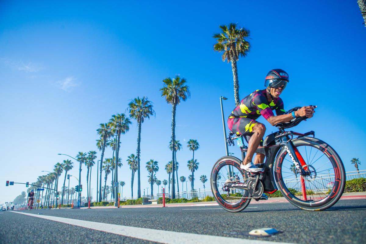 Man cycling on his bike in Huntington Beach