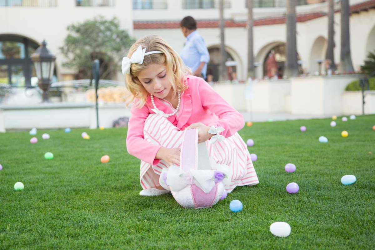 Eater Brunch at Hyatt Regency Huntington Beach Resort & Spa | Girl picking up easter eggs