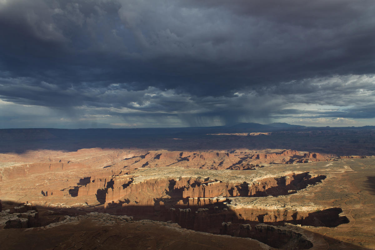 Canyonlands National Park with a gathering storm from the Grand View Overlook