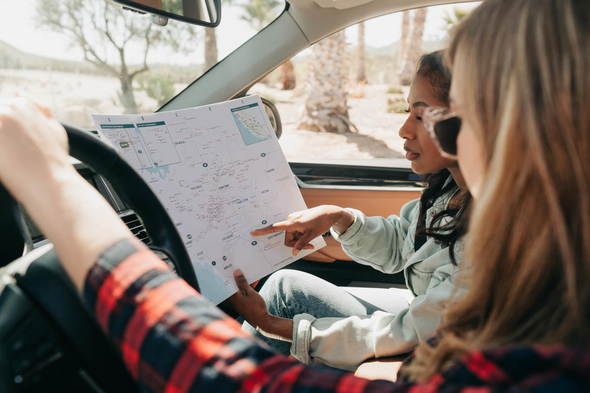 Ladies Looking at Wine Country Map