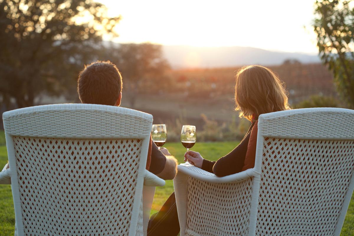 couple drinking wine at sunset_juice media credit_0