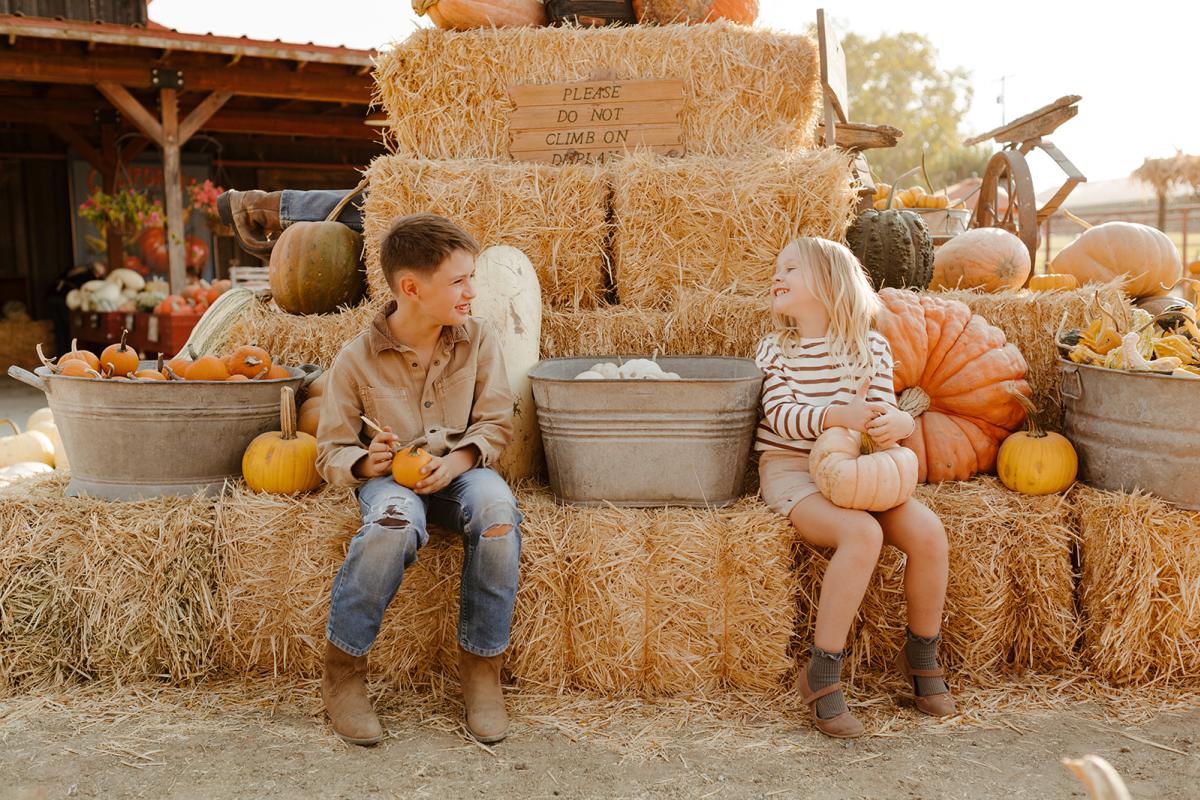 Kids Holding Pumpkins