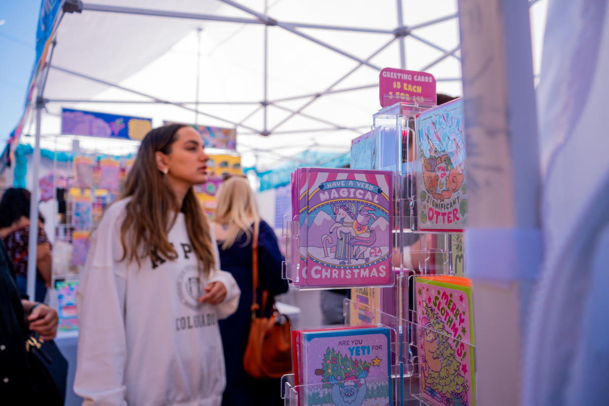 Young woman shopping at the Winter Fourth Ave Street Fair