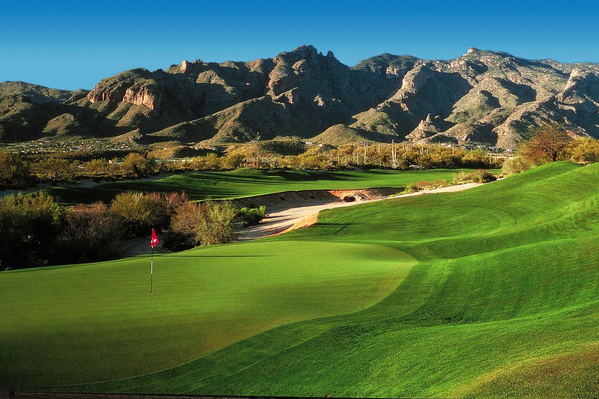 Green golf course at La Paloma with Mountain scenery in background