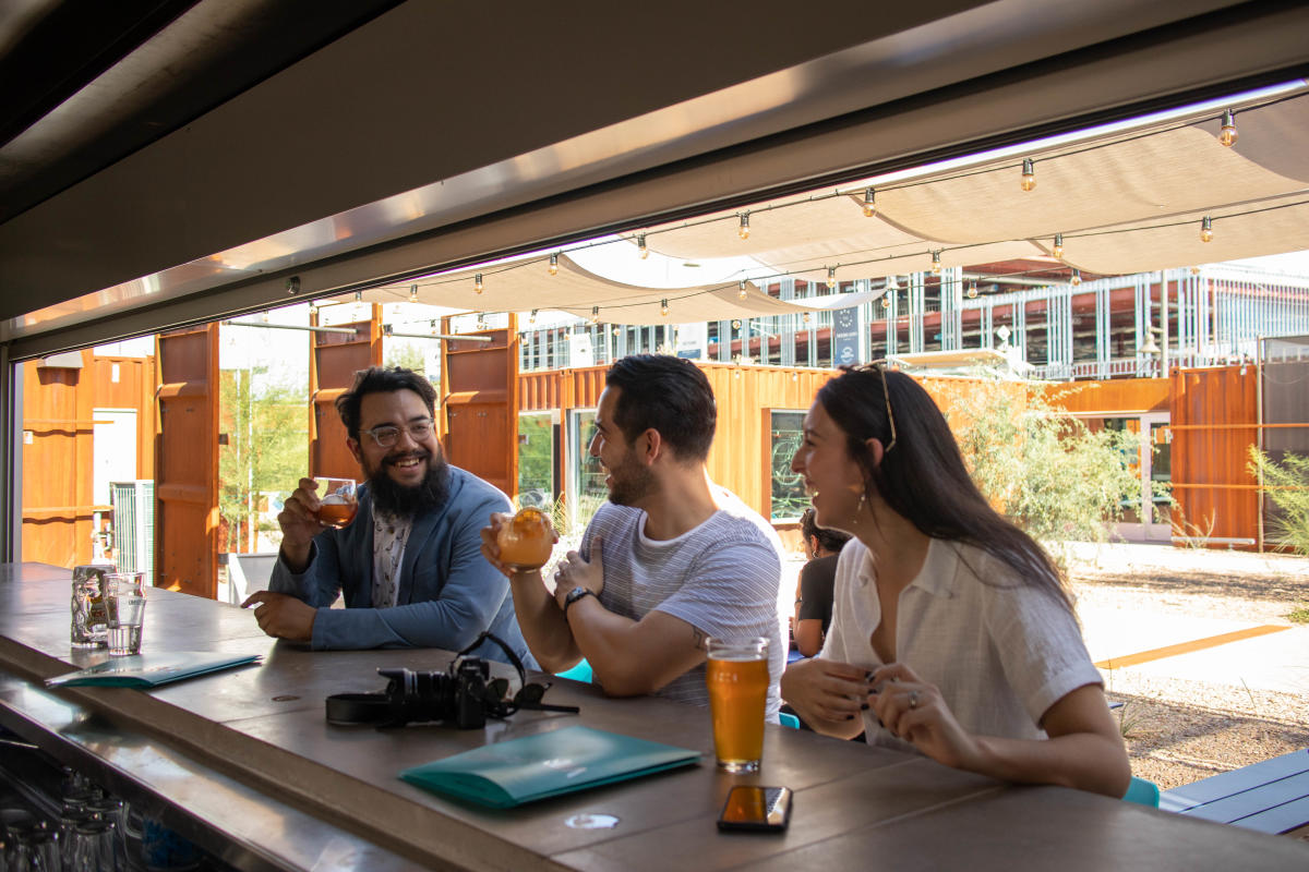People sitting outside at Westbound Bar at MSA Annex