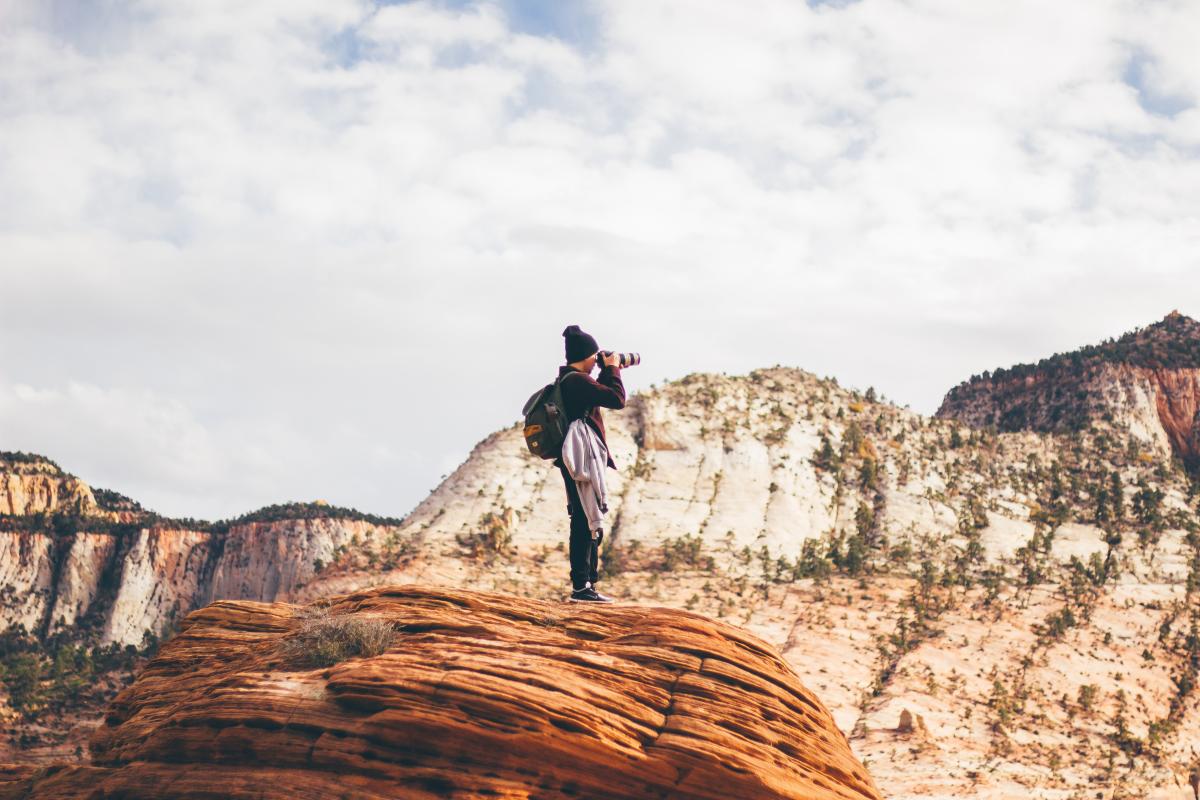 Man taking pictures in Zion National Park