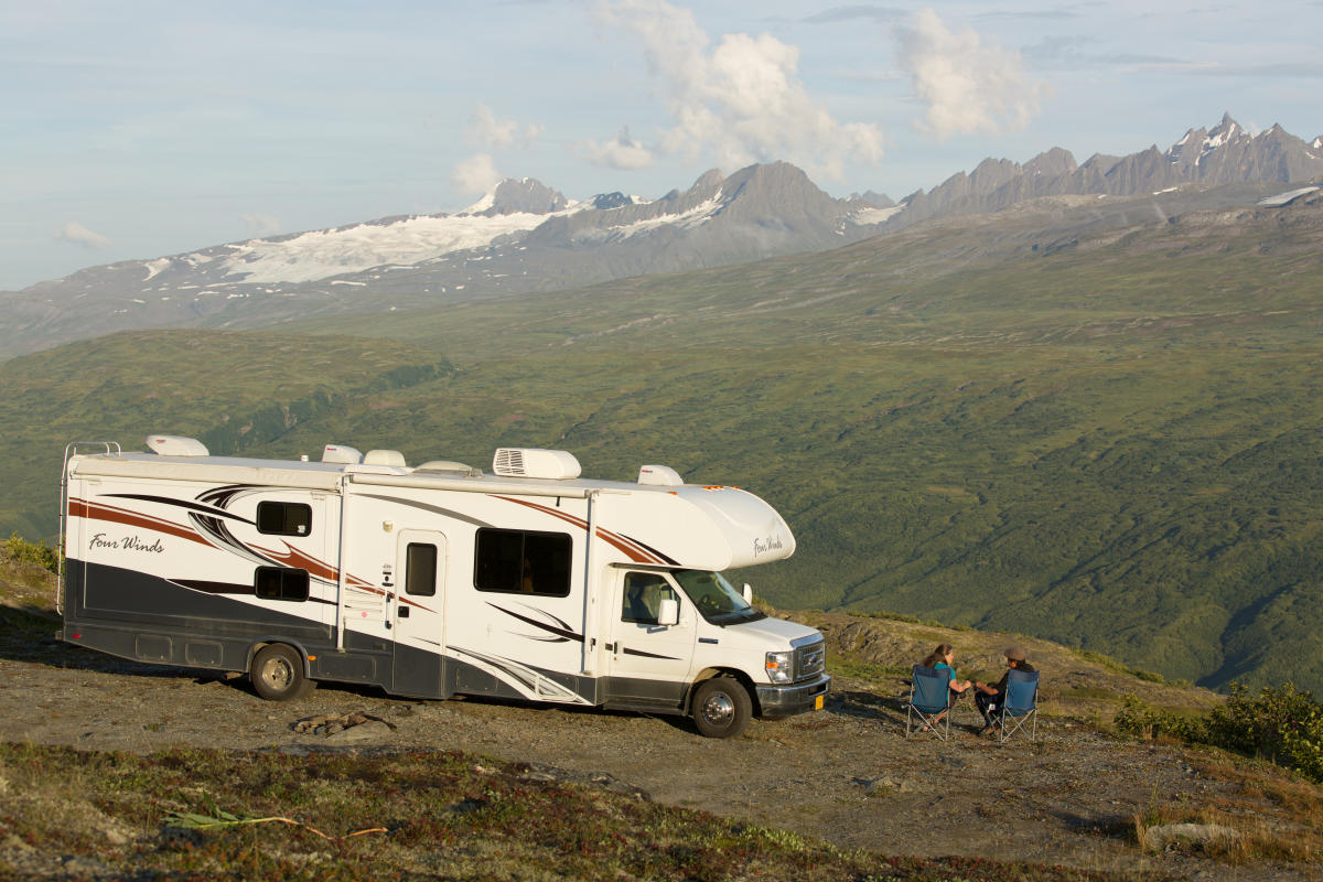 an RV parked in a mountain pass