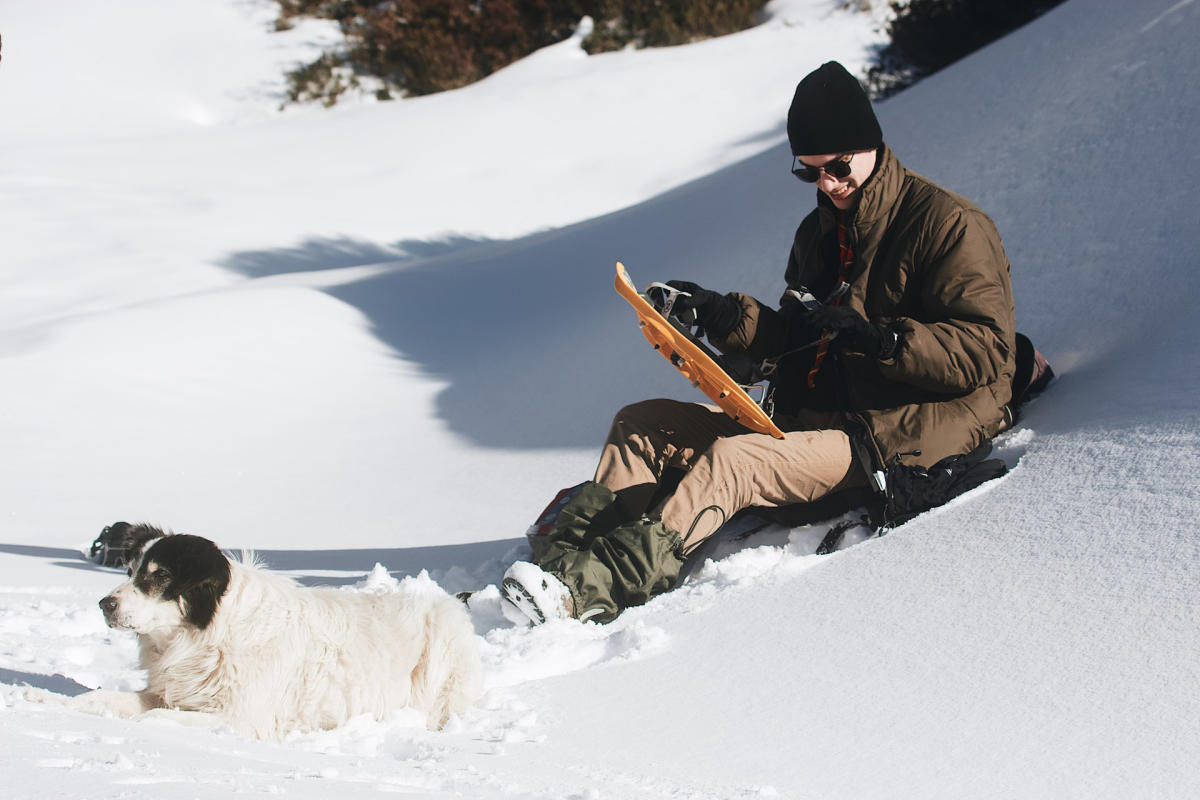 Snow shoer with dog