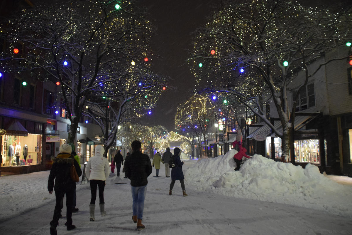 Christmas lights on Church Street with snow cover streets