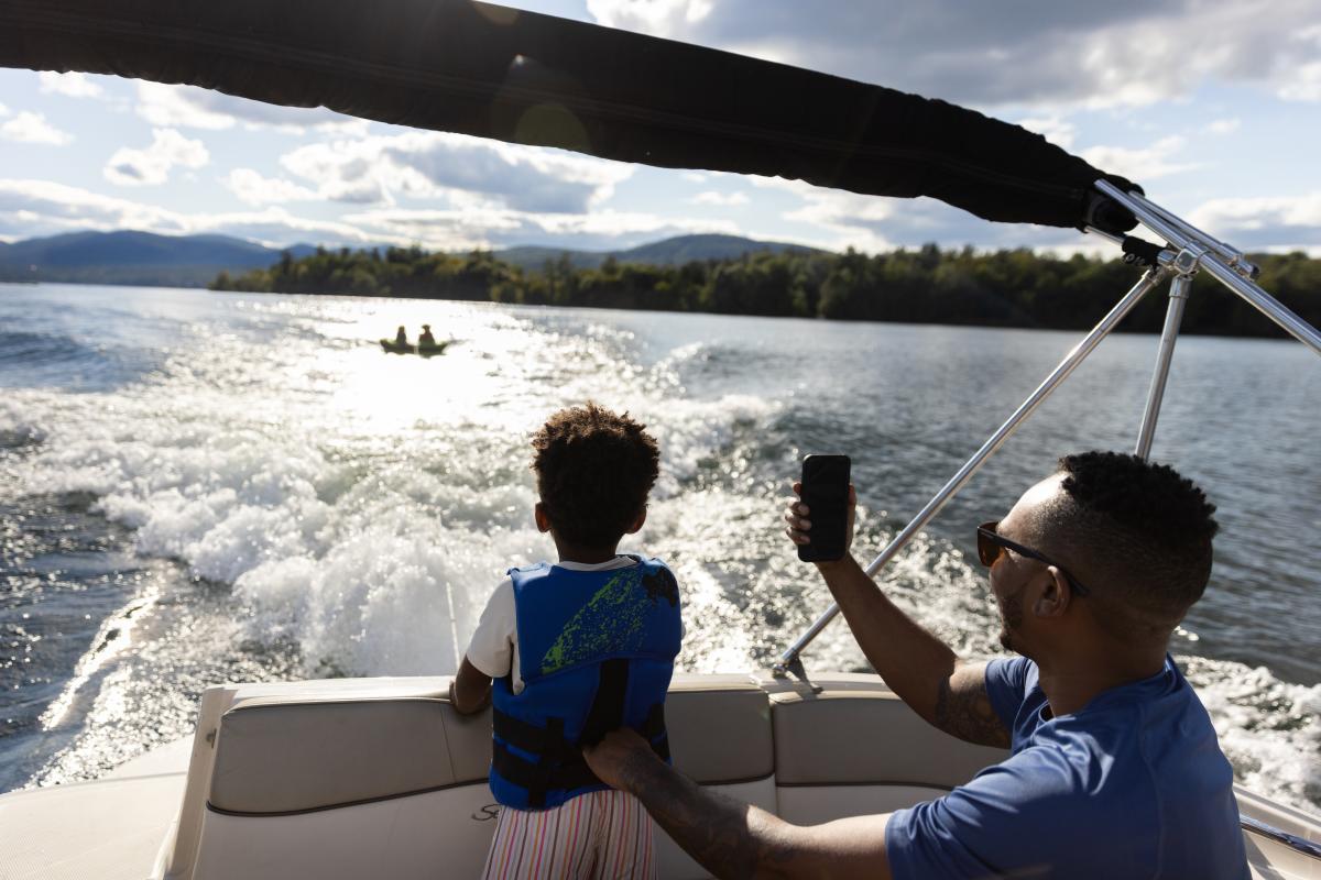 Family of Four Tubing and Boating on Lake George