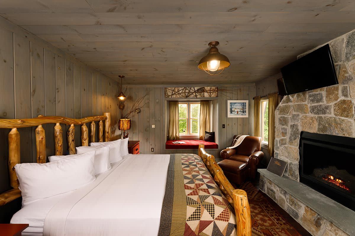 A Room with a Fireplace at the Friends Lake Inn