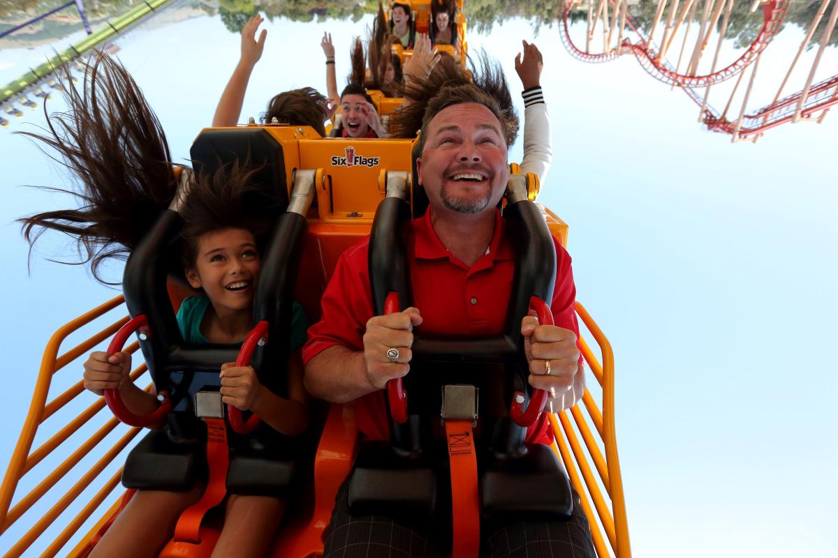 Family Riding a Roller Coaster