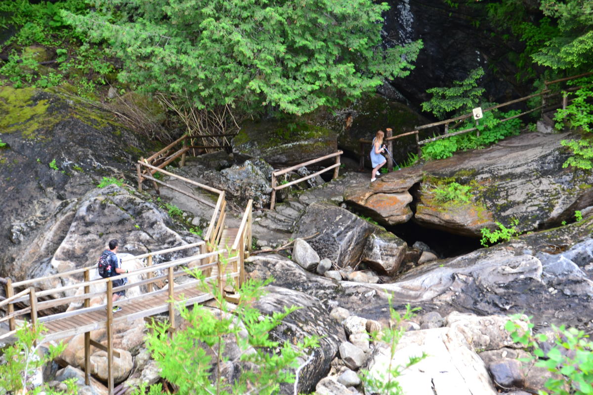 People Hiking at Natural Stone Bridge & Caves
