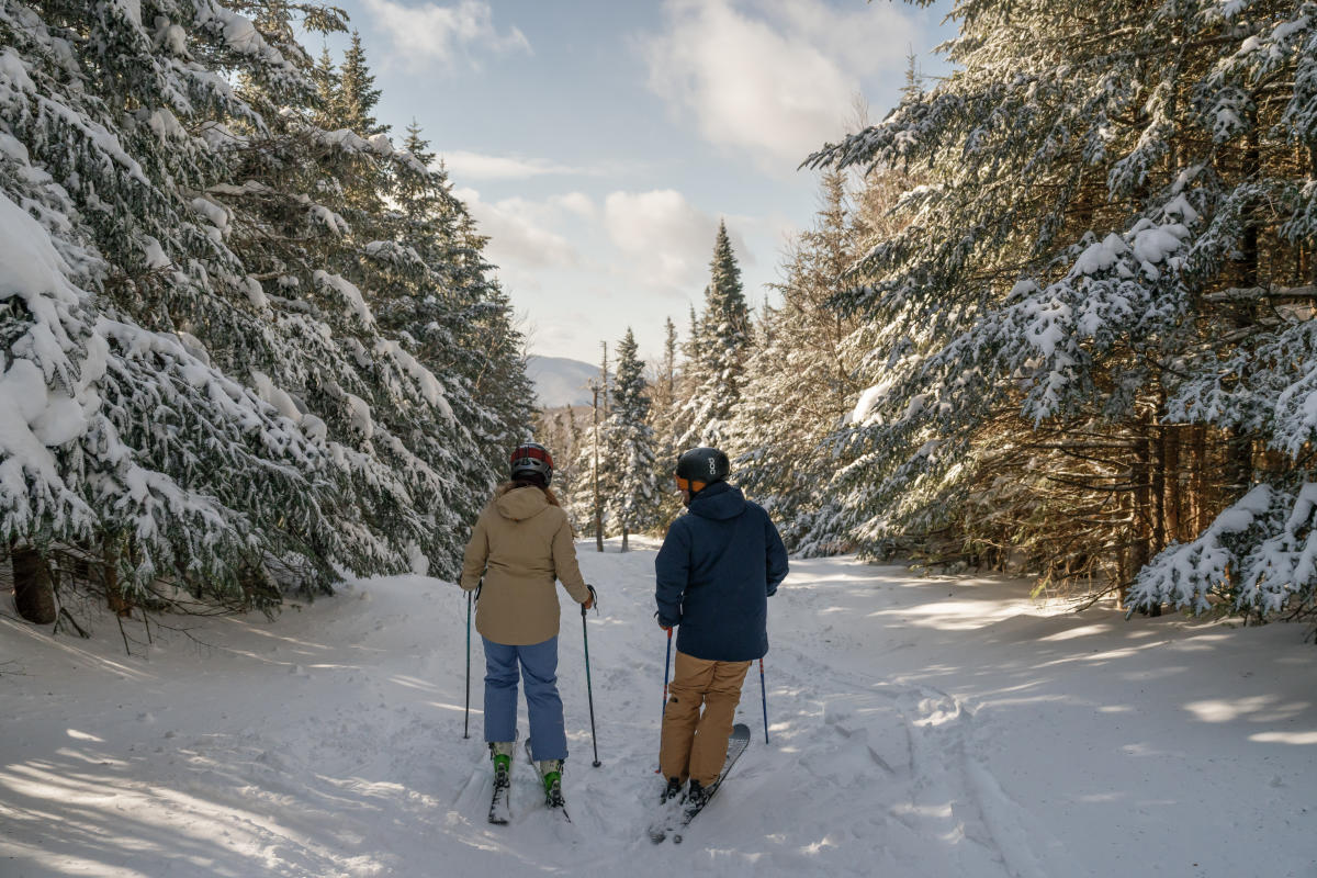 Couple skiing down Gore Mountain