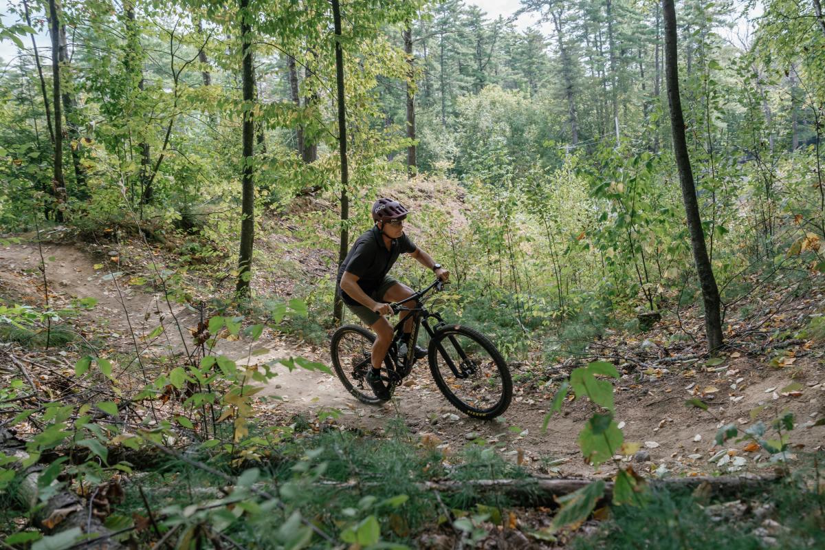Man mountain biking at Gurney Lane Mountain Bike Park