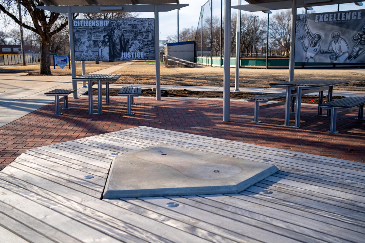 A plate sits empty at McAdams Park where the bronze Jackie Robinson statue once stood