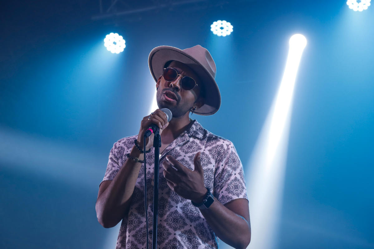 Rudy Love Jr. sings during a performance in Wichita