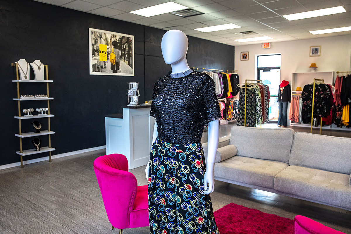 A mannequin is dressed at Bon-ny boutique in the NOMAR International Market shopping district