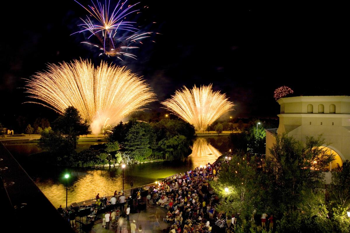 Fireworks explode over Bradley Fair during a Fourth of July celebration