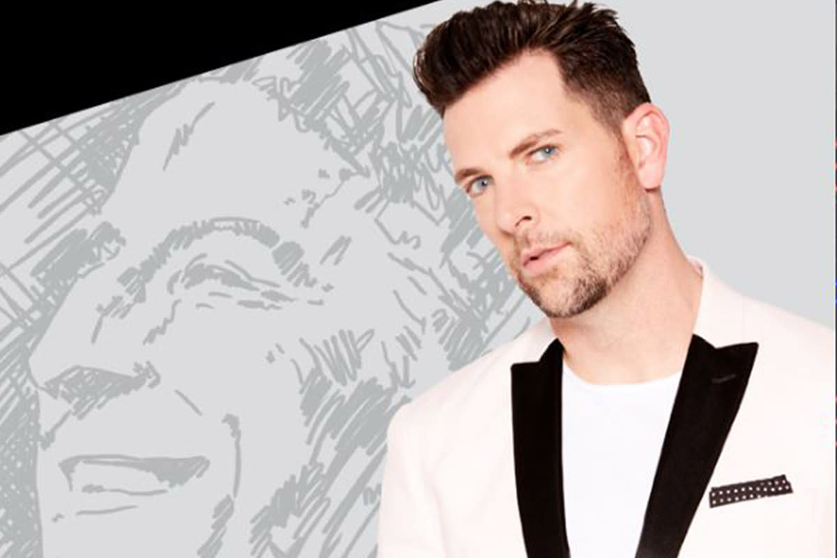Singer Chris Mann poses for a poster advertising his performance at the Orpheum Theatre