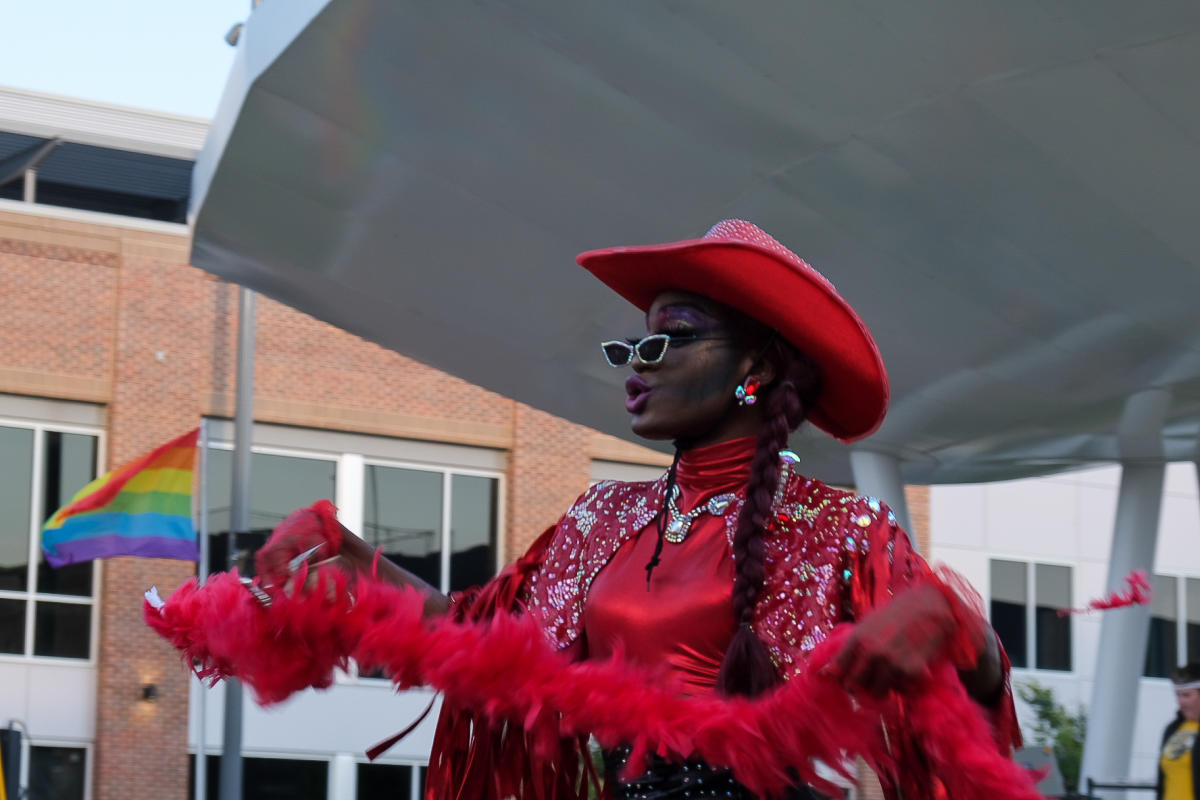 A performer takes the stage during Pride Festival at Wichita's Naftzger Park