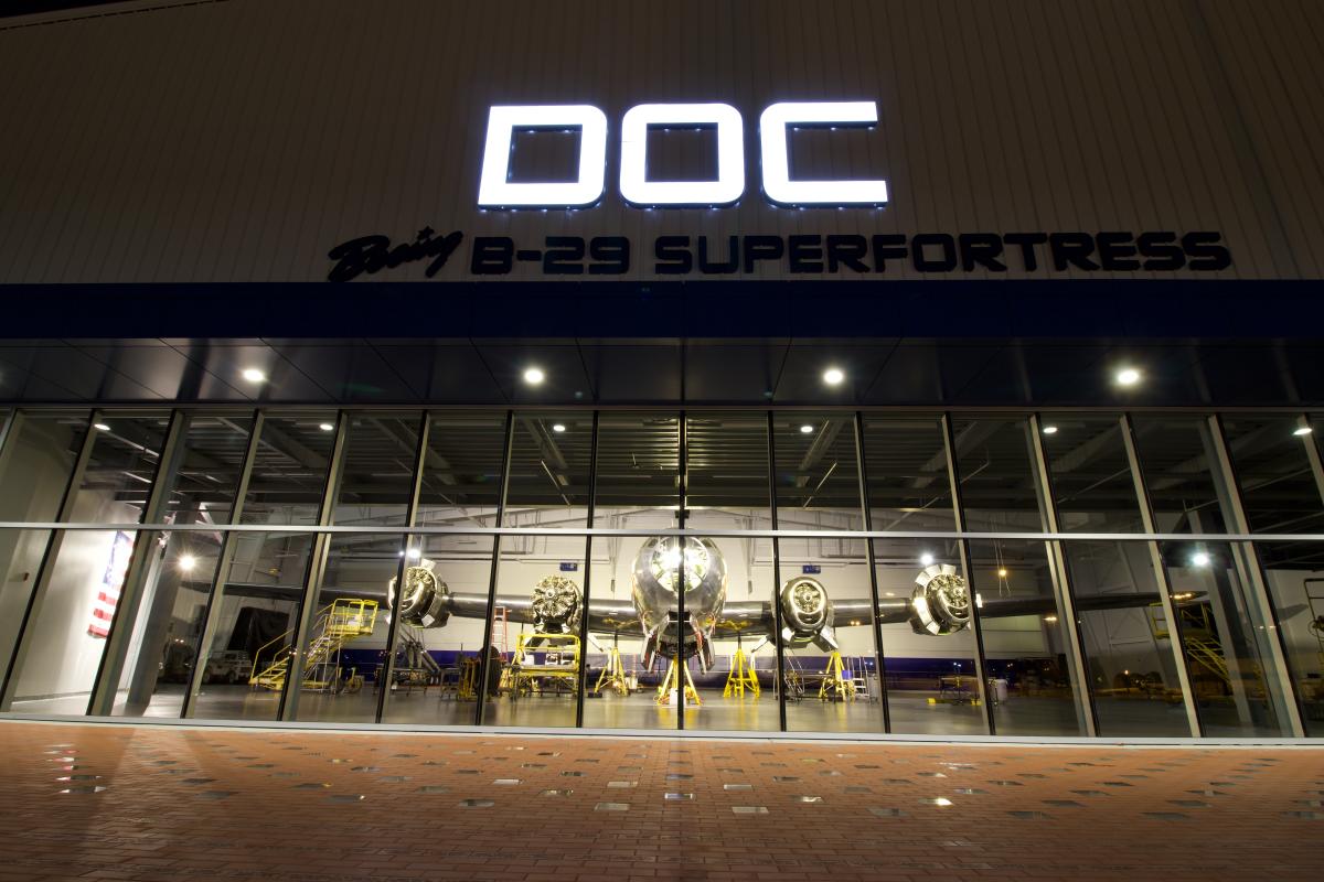 The B-29 Doc Superfortress is photographed at night while inside its hangar