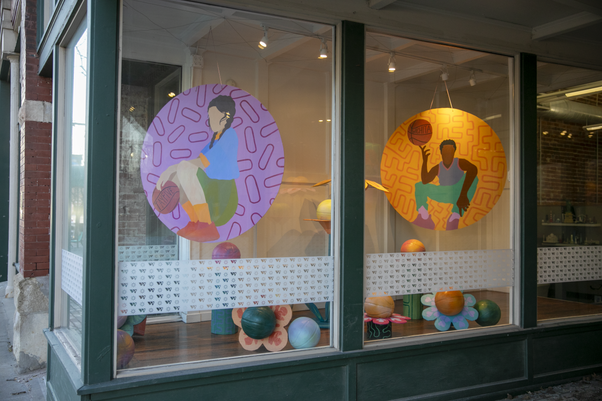 Artwork created by recycled basketball materials decorates a storefront in Wichita