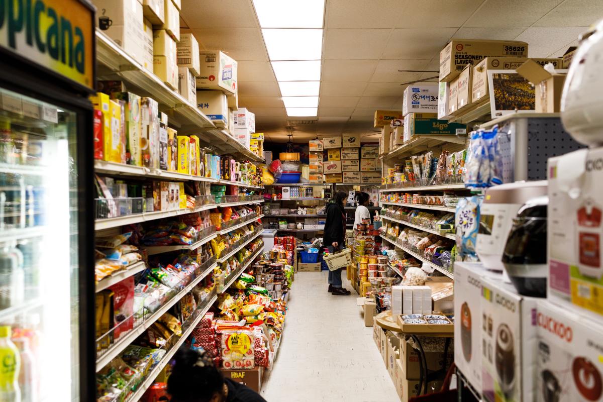 Shoppers select Asian products at Grace Market in Wichita