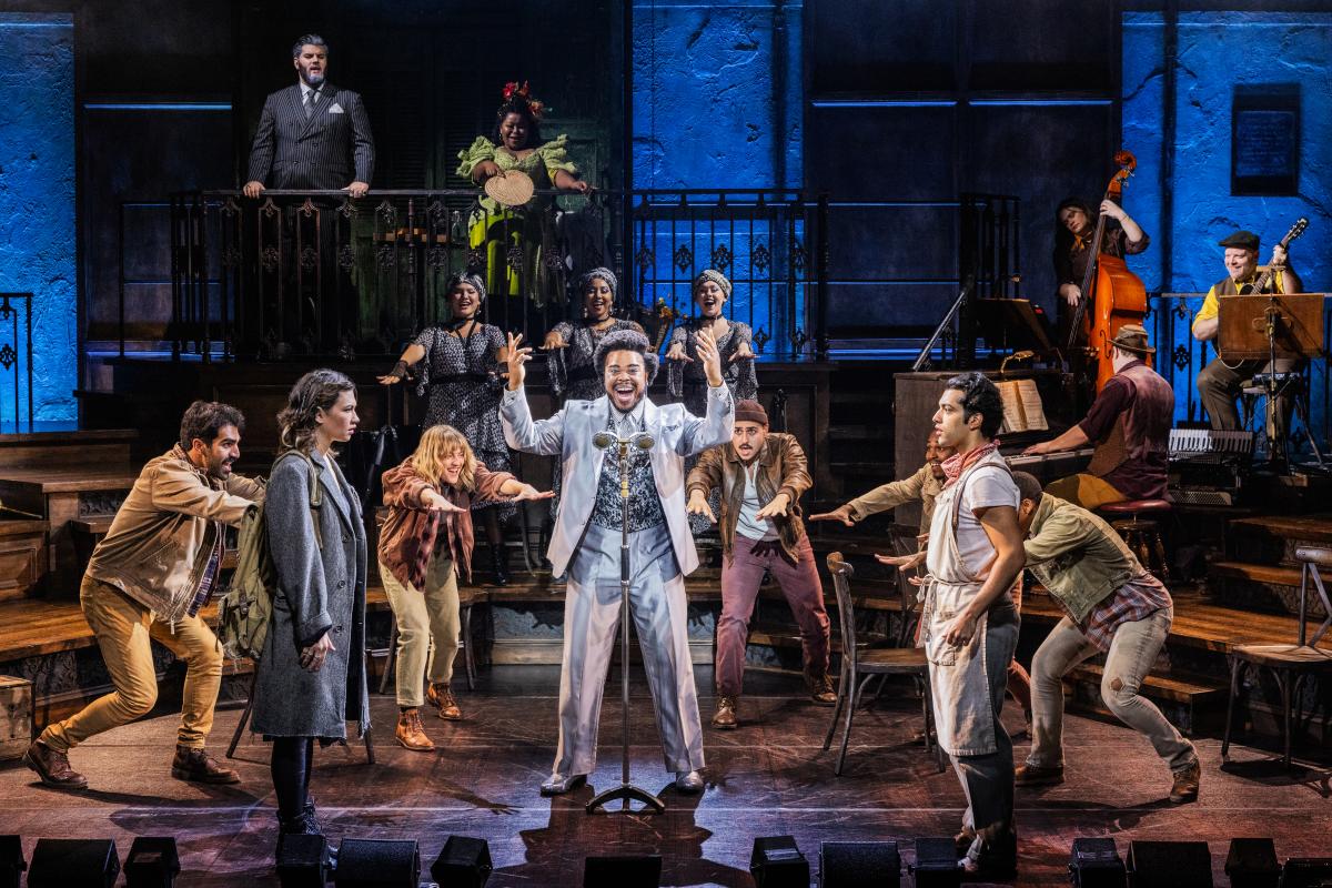 Actors perform on stage during "Hadestown"