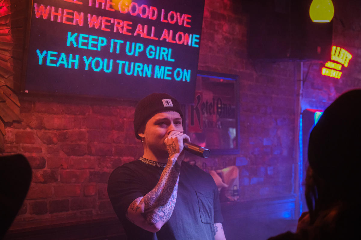 DJ Sunshine sings karaoke at a bar in Wichita