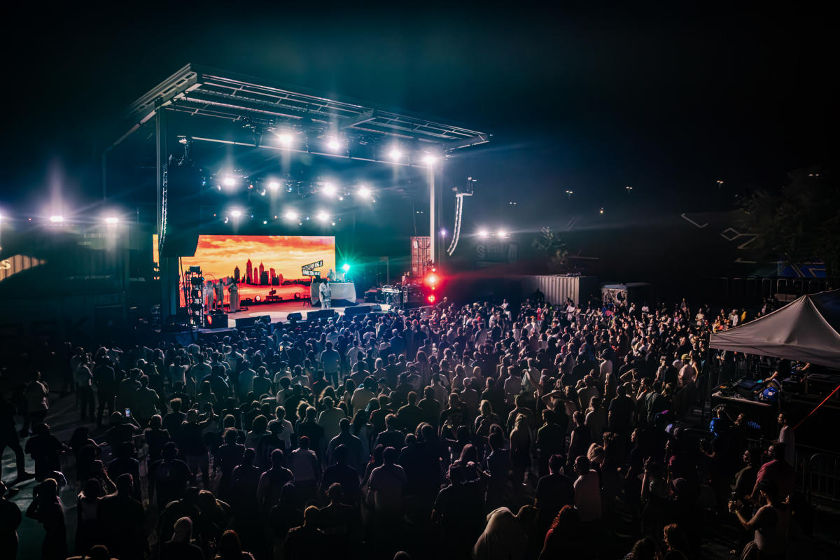 Crowds gather to watch at concert at WAVE during Somewhere Fest