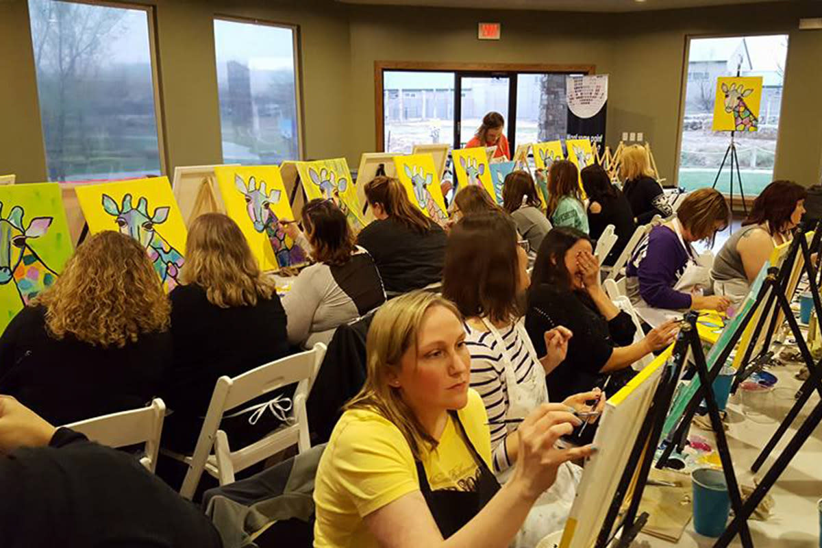 A group paints pictures at Paint the Towne