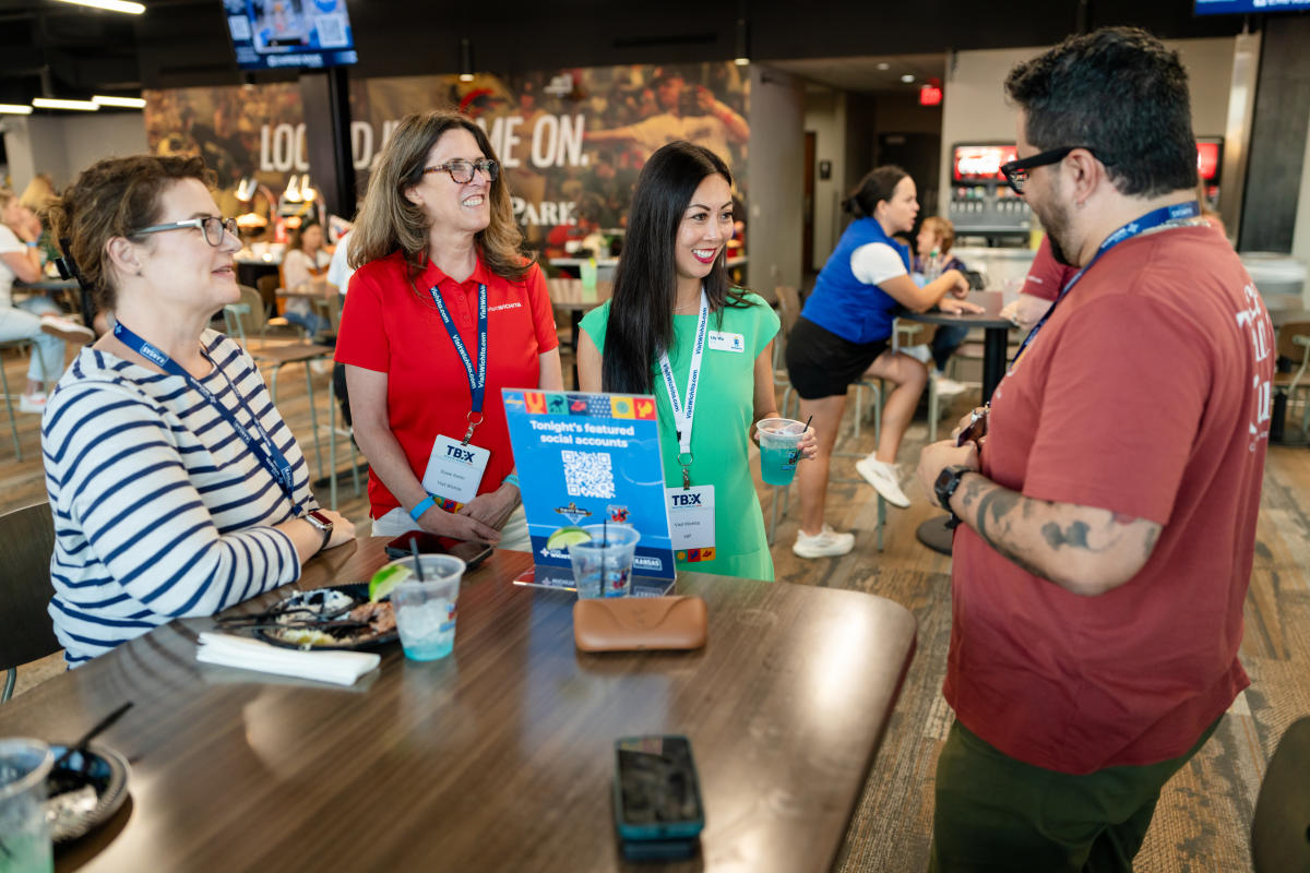 TBEX attendees enjoy talking while at their dinner at Equity Bank Park.