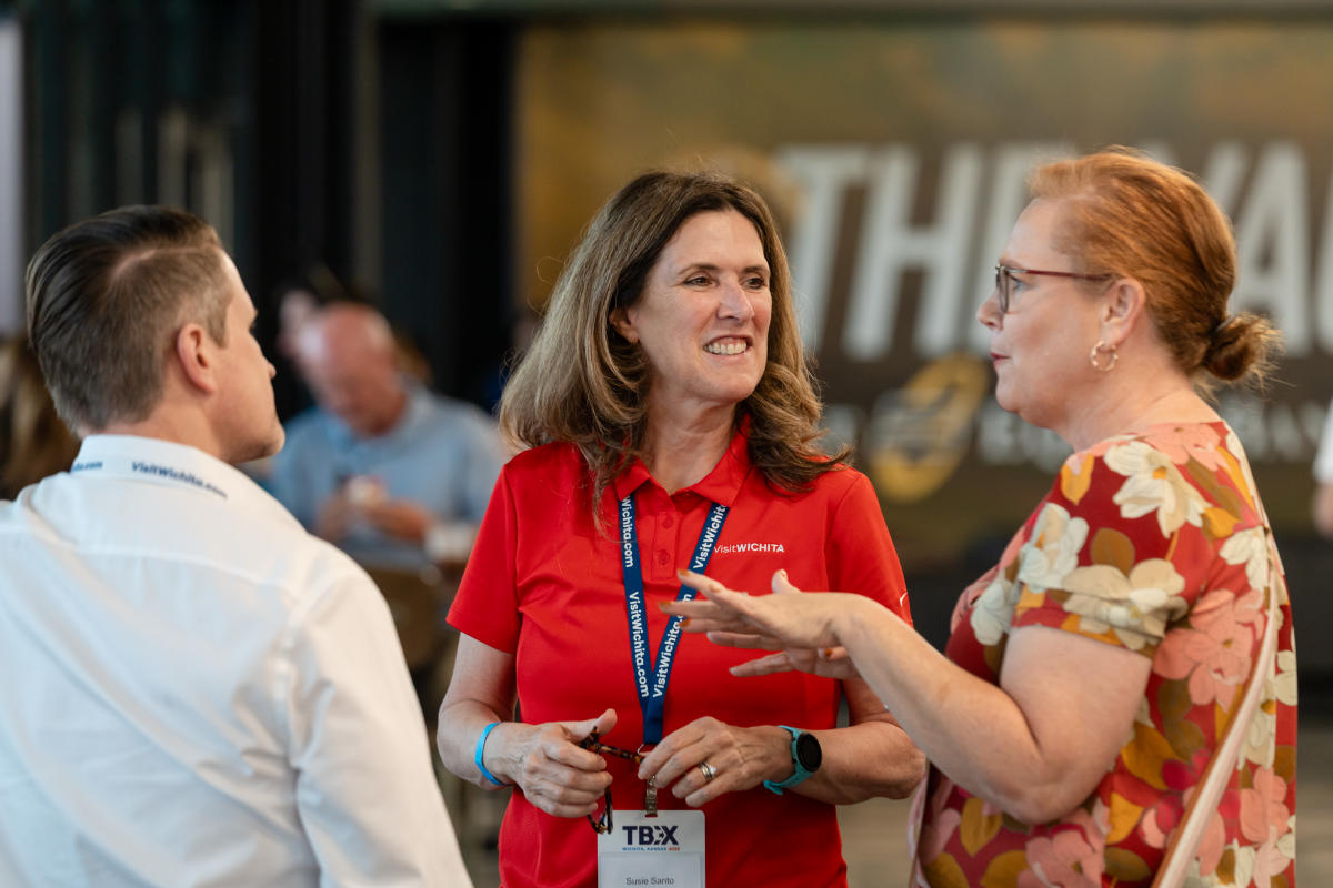 Visit Wichita President and CEO Susie Santo visits with TBEX attendees at Equity Bank Park in Wichita.