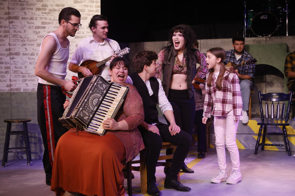 Actors perform while on stage during a performance of "Once" at Roxy's Downtown