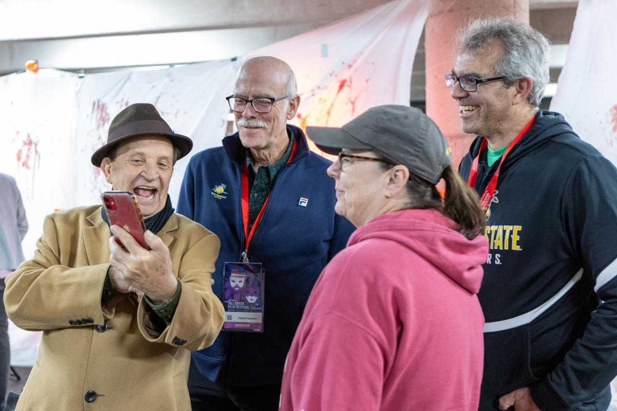 People talk in between screenings at Tallgrass Film Festival