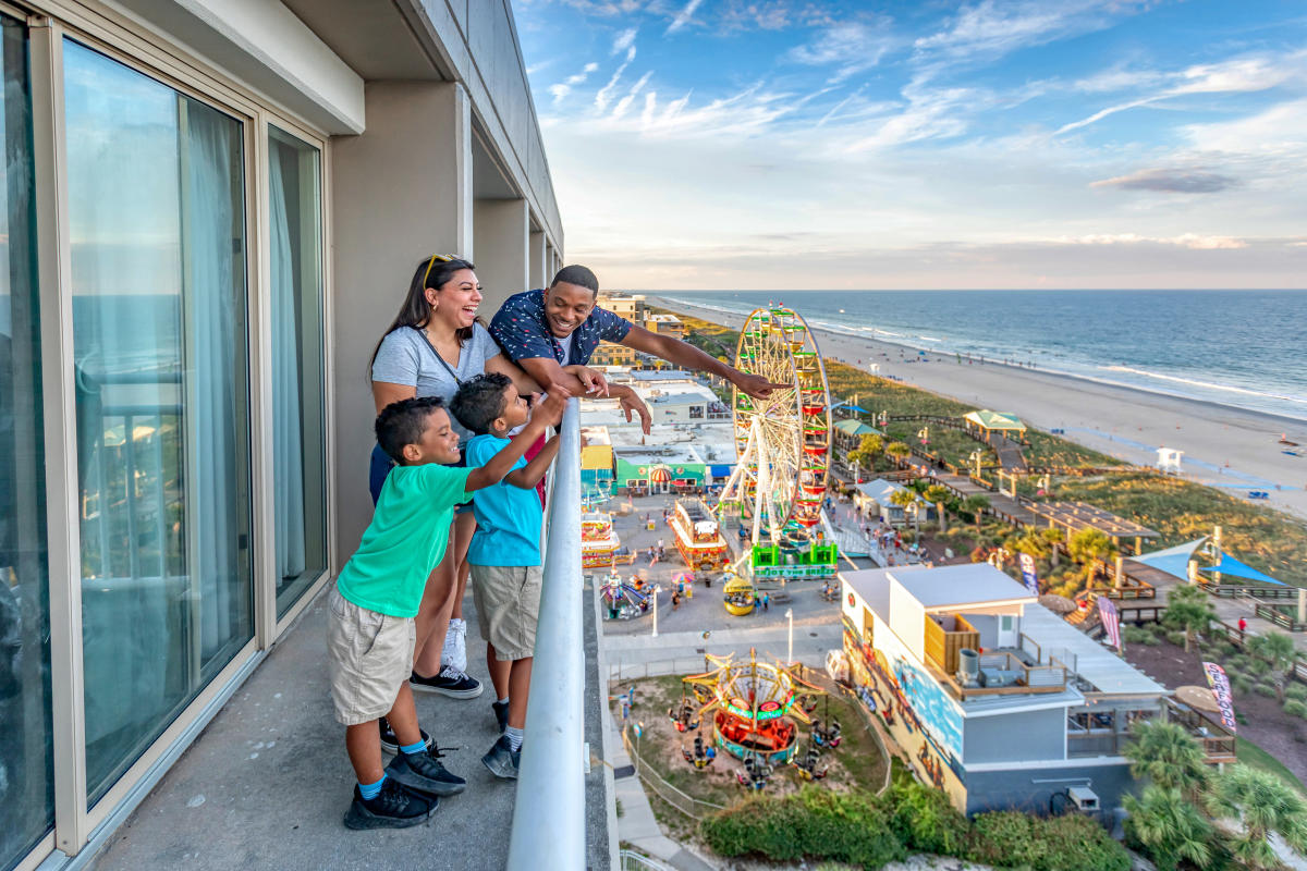 Family on Balcony at Carolina Beach