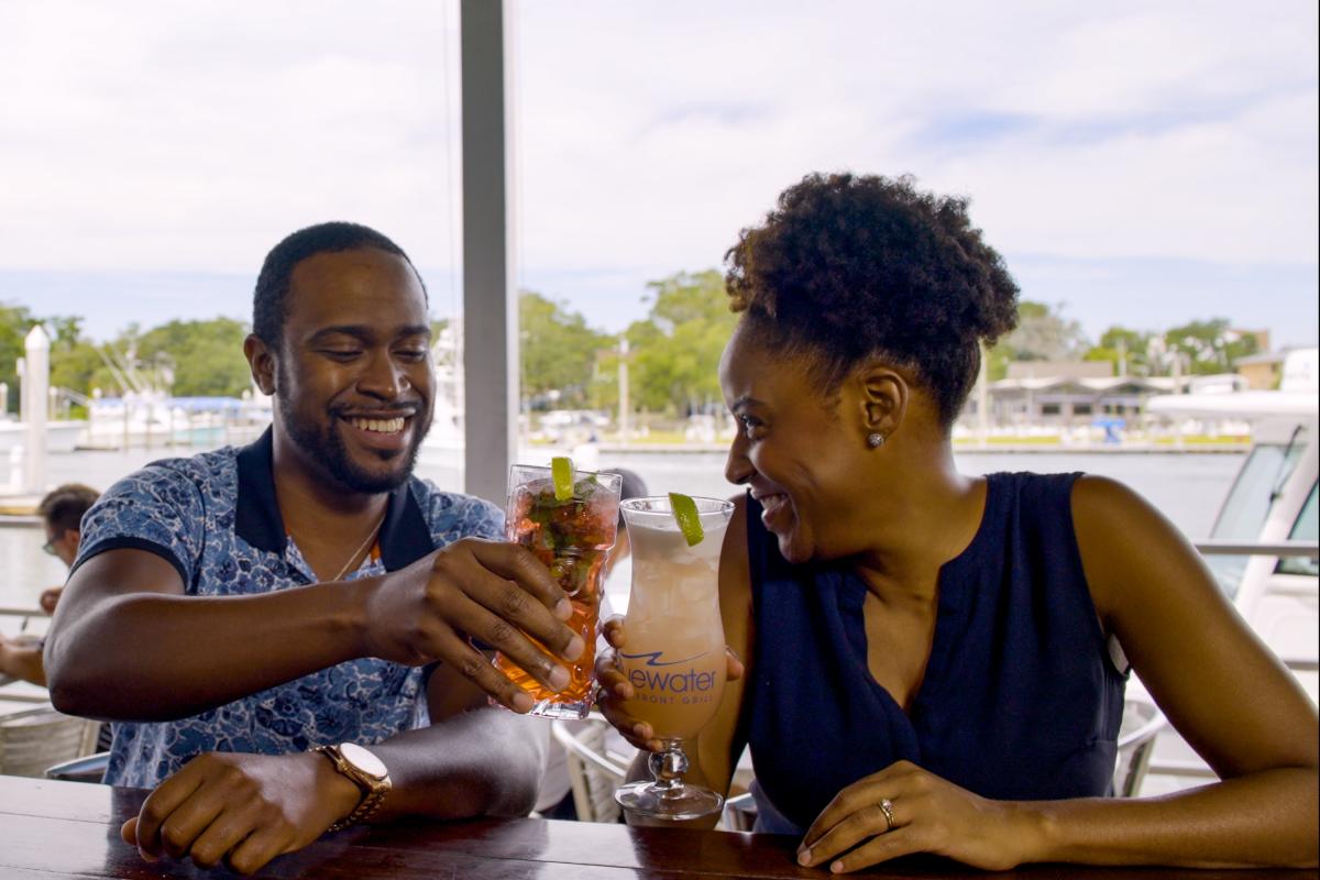 Bluewater Waterfront Grill Couple Enjoying Drinks