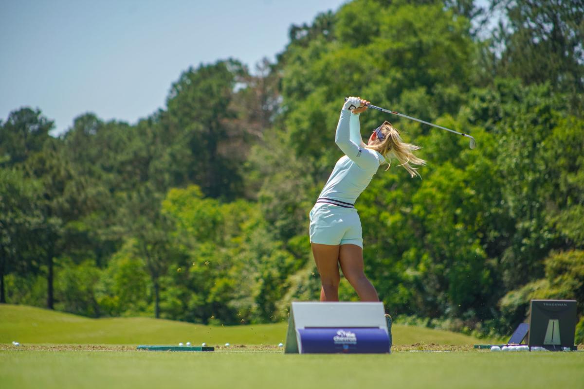 Woman golfing during The Chevron Championship in The Woodlands, Texas