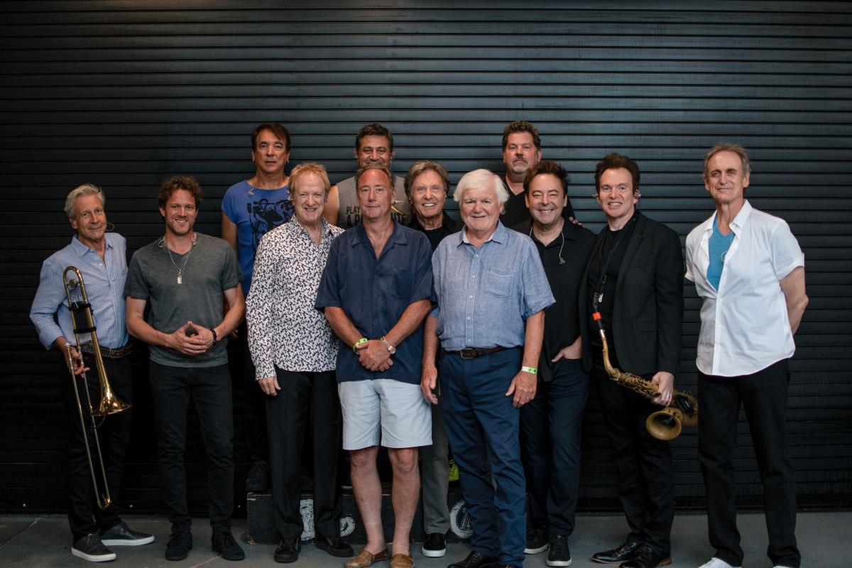 Jerry MacDonald, CWMP President & CEO; Bob Roux, President of US Concerts for Live Nation; and all Chicago band members.