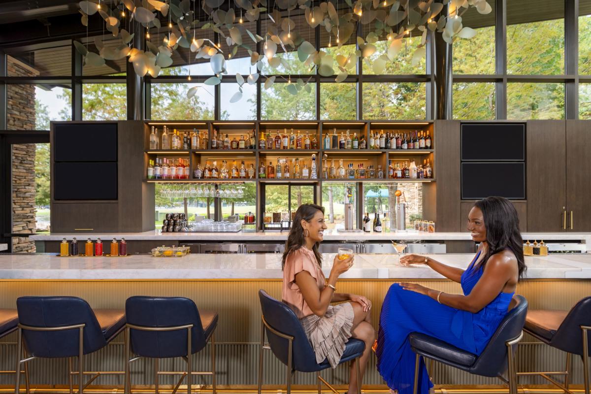Two women sitting at The Lobby Bar at The Woodlands Resort in The Woodlands, Texas