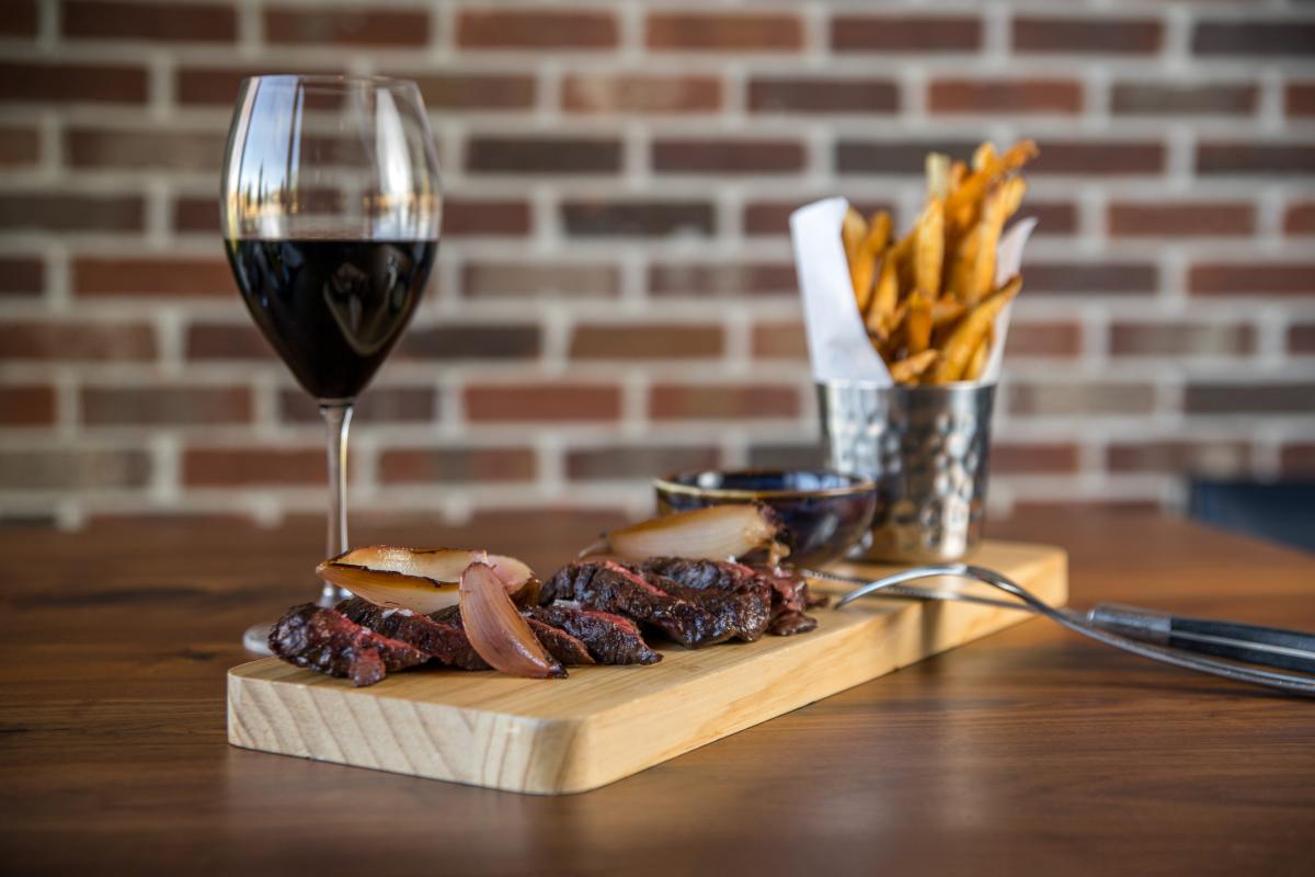 Steak Frites with a glass of wine