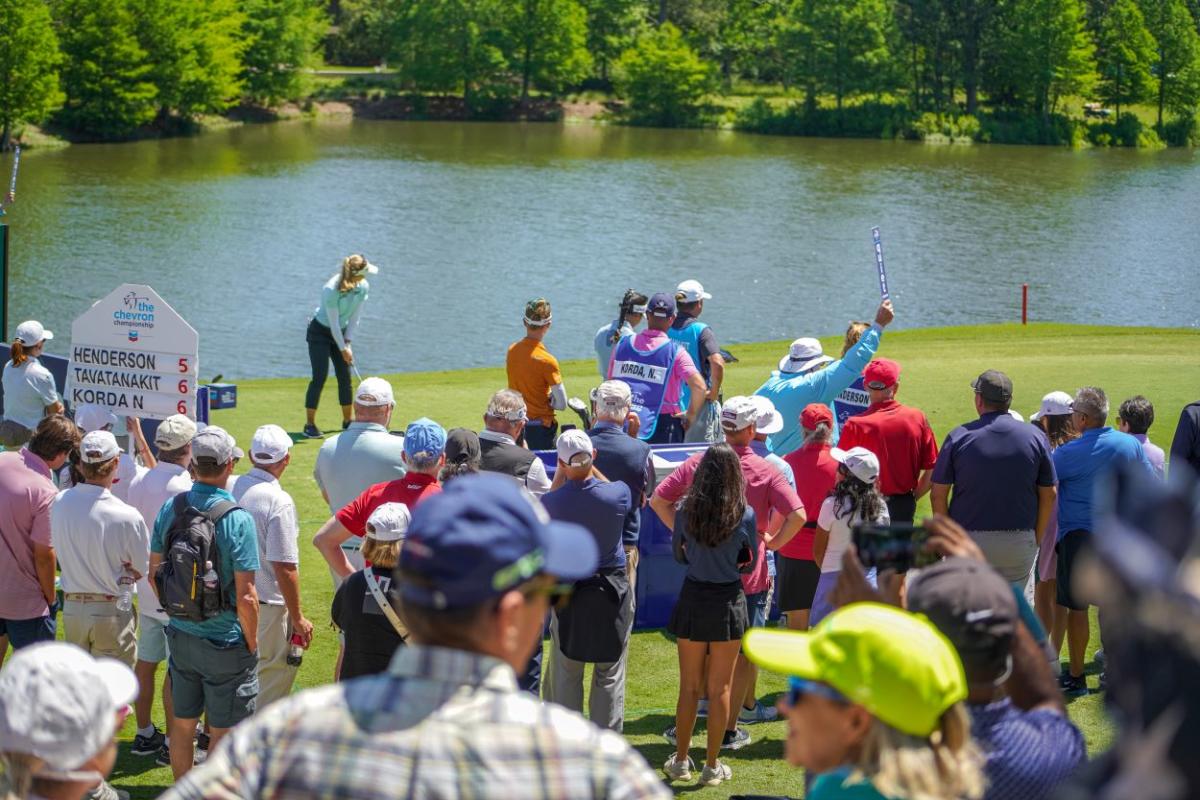 Spectators watching golfers during The Chevron Championship in The Woodlands, Texas